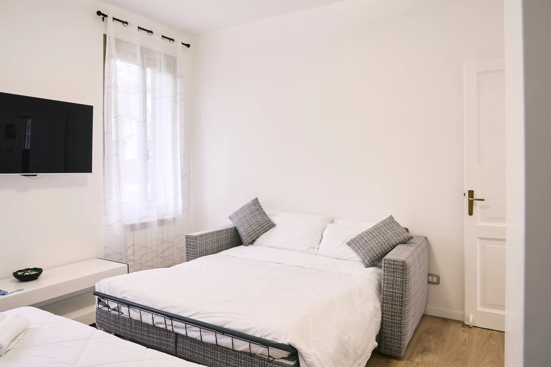 Camera di Dimora Castelli con letto matrimoniale e divano letto